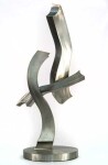 Free flowing, the elegant s-shaped curves of this sculpture were created by American artist, Kevin Robb. Image 4