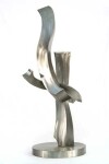 Free flowing, the elegant s-shaped curves of this sculpture were created by American artist, Kevin Robb. Image 2