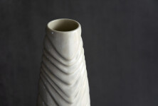 This contemporary white ceramic vessel is handmade. Image 3