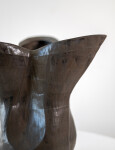 This contemporary ceramic black floral shaped vessel is by Loren Kaplan. Image 6
