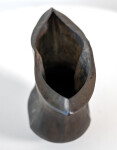 This contemporary ceramic black vessel in a floral shape is by Loren Kaplan. Image 9