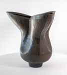 This contemporary ceramic black floral shaped vessel is by Loren Kaplan. Image 3