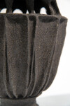 This contemporary ceramic vessel was inspired by nature and rendered in black. Image 6