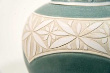 Intricate patterns reminiscent of ancient ceramics adorn Loren Kaplan’s newest porcelain jars. Image 6