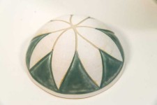 Intricate patterns reminiscent of ancient ceramics adorn Loren Kaplan’s newest porcelain jars. Image 5