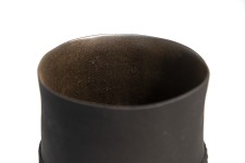 This exquisitely detailed basalt clay vessel was created by Loren Kaplan. Image 4
