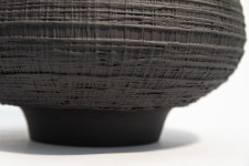 This exquisitely detailed basalt clay vessel was created by Loren Kaplan. Image 2