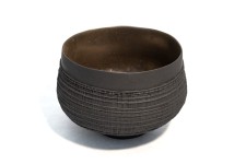 This exquisitely detailed basalt clay vessel was created by Loren Kaplan. Image 3