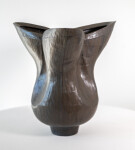 This contemporary ceramic black floral shaped vessel is by Loren Kaplan. Image 5