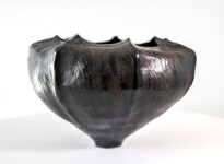 This contemporary ceramic black bowl is by Loren Kaplan. Image 2