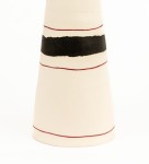 At once elegant and striking in their design, these porcelain vessels were created by Loren Kaplan. Image 4