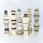 At once elegant and striking in their design, these porcelain vessels were created by Loren Kaplan. Image 5
