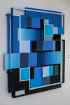 This contemporary abstract mixed media composition consists of predominantly blue geometric shapes. Image 4