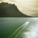 This dream-like photograph of a sunlit ferry crossing an expanse of sea was taken by Mark Bartkiw. Image 4