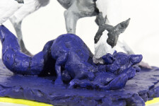 A cast resin figurine of a hound who has hunted a fox, which in turn has hunted a goose is patinated in indigo, black and white by emerging … Image 3