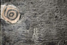 The textured surface of water, still and dark, meets a strip of cream coloured sky in this long horizontal canvas. Image 3