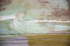 A rich black ground undulates at the horizon where it meets geometric passages of crimson, ochre, grey, white, and peach below a moss green … Image 4