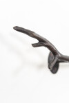 This contemporary indoor bronze figurative sculpture of a male is designed to be mounted on the wall. Image 11