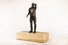 This bronze figurative table top sculpture by Roch Smith features a maple leaf. Image 2