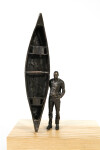 This bronze figurative tabletop sculpture by Roch Smith features a canoe. Image 6