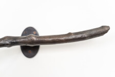 This contemporary indoor bronze figurative sculpture of a male is designed to be mounted on the wall. Image 8