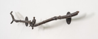 This contemporary indoor bronze figurative sculpture of a male is designed to be mounted on the wall. Image 4