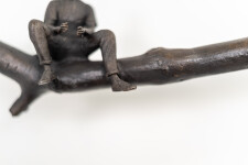 This contemporary indoor bronze figurative sculpture of a male is designed to be mounted on the wall. Image 6