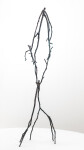 This contemporary figurative tabletop sculpture is forged in bronze. Image 5