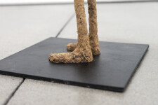 This contemporary figurative floor sculpture is created from papier mâché. Image 8