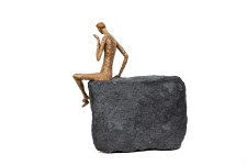 This contemporary figurative table top sculpture is made from papier mâché. Image 5
