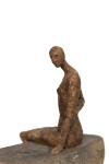 This contemporary figurative female table top sculpture is made from papier mâché. Image 10