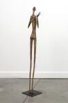 This contemporary figurative floor sculpture is created from papier mâché. Image 5