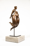 A voluptuous female figure is rendered in this compelling modern tabletop bronze sculpture by Paul Duval. Image 4