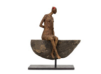 This contemporary figurative female table top sculpture is made from papier mâché. Image 2