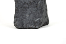 This contemporary figurative male table top sculpture is made from papier mâché. Image 6