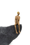 This contemporary figurative table top sculpture is made from papier mâché. Image 7