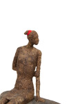 This contemporary figurative female table top sculpture is made from papier mâché. Image 9