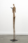 This contemporary figurative floor sculpture is created from papier mâché. Image 6