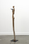 This contemporary figurative floor sculpture is created from papier mâché. Image 7