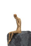 This contemporary figurative table top sculpture is made from papier mâché. Image 2