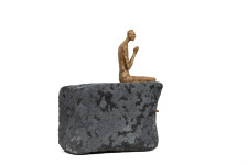 This contemporary figurative male table top sculpture is made from papier mâché. Image 7