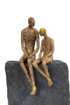 This contemporary figurative table top sculpture of a father and son is created from papier mâché. Image 7