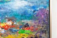 Beneath a deep blue, cloudy sky, the bright colours of what appears to be a tropical landscape –red, yellow, purples and green pop from the … Image 5