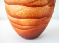 This contemporary saffron coloured ceramic vase has an organic shape inspired by nature. Image 5