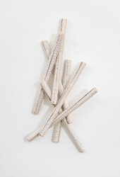 This contemporary sculptural ceramic wall composition is by Paula Murray.