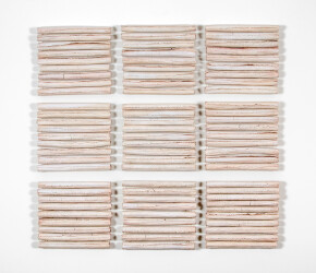 This contemporary white porcelain wall sculpture is by Paula Murray.