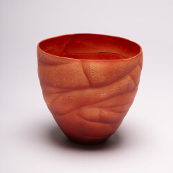 This contemporary saffron coloured ceramic vase has an organic shape inspired by nature.