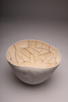 This white ceramic vessel’s organic shape was inspired by nature. Image 8