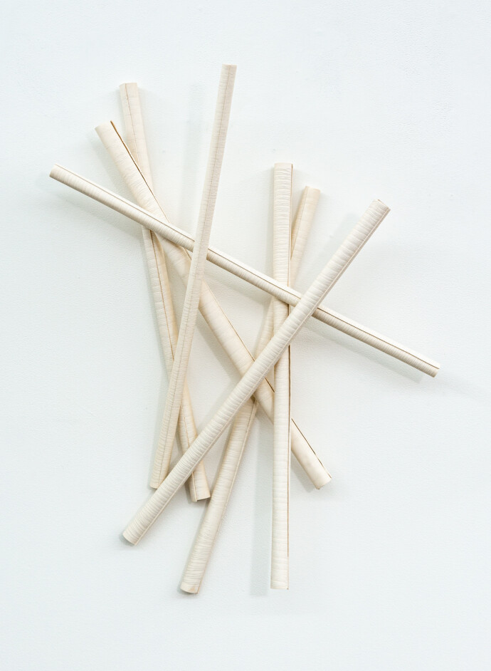 This contemporary sculptural ceramic wall composition is by Paula Murray.