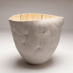 This white ceramic vessel’s organic shape was inspired by nature. Image 4